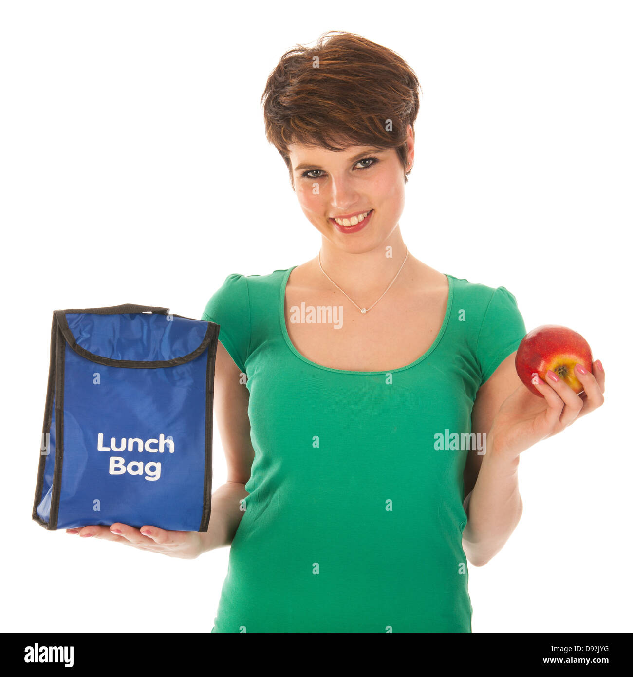 Woman with lunch bag is eating an apple Stock Photo Alamy