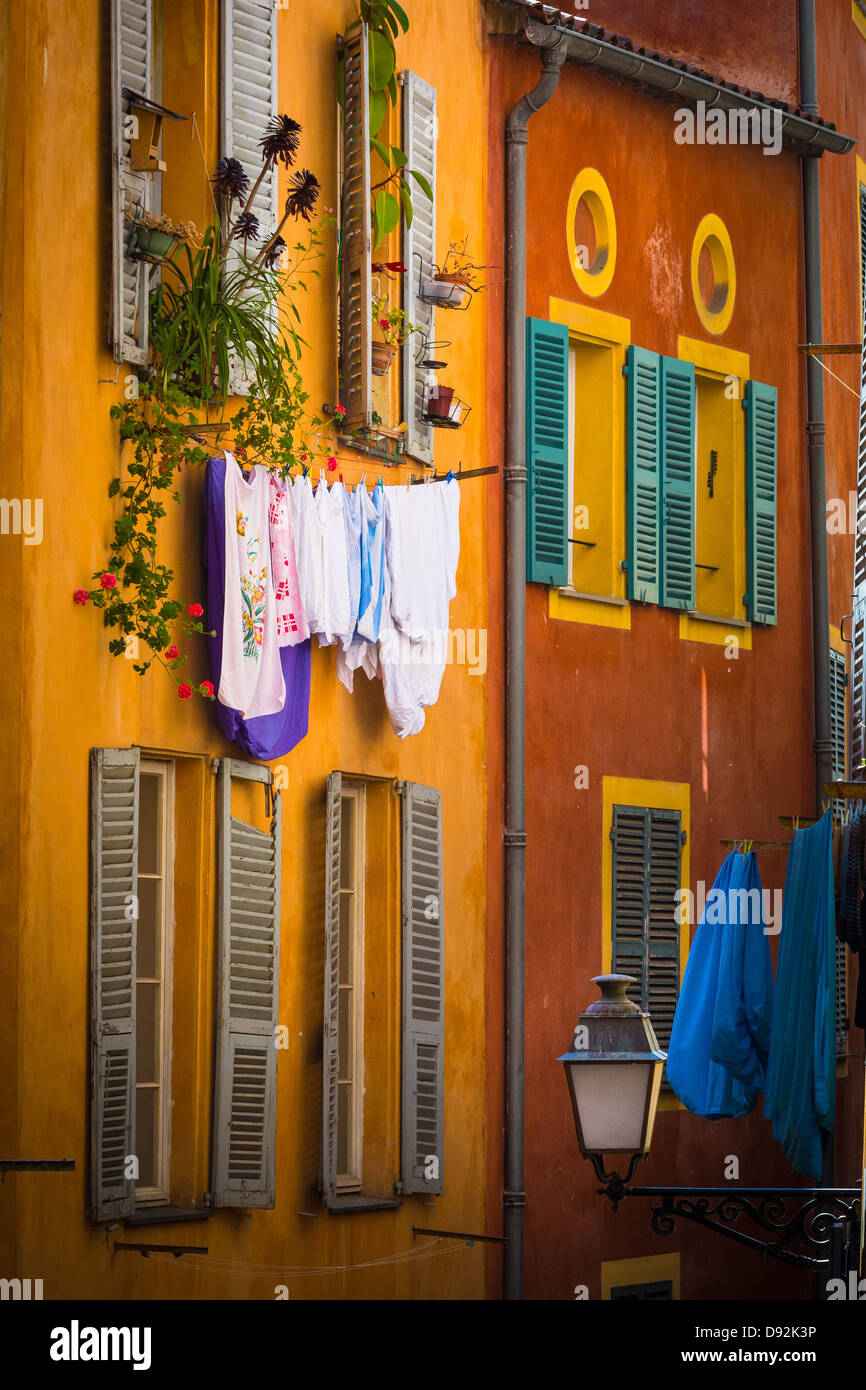 Typical French windows in the 'Vielle Ville' part of Nice, France Stock Photo