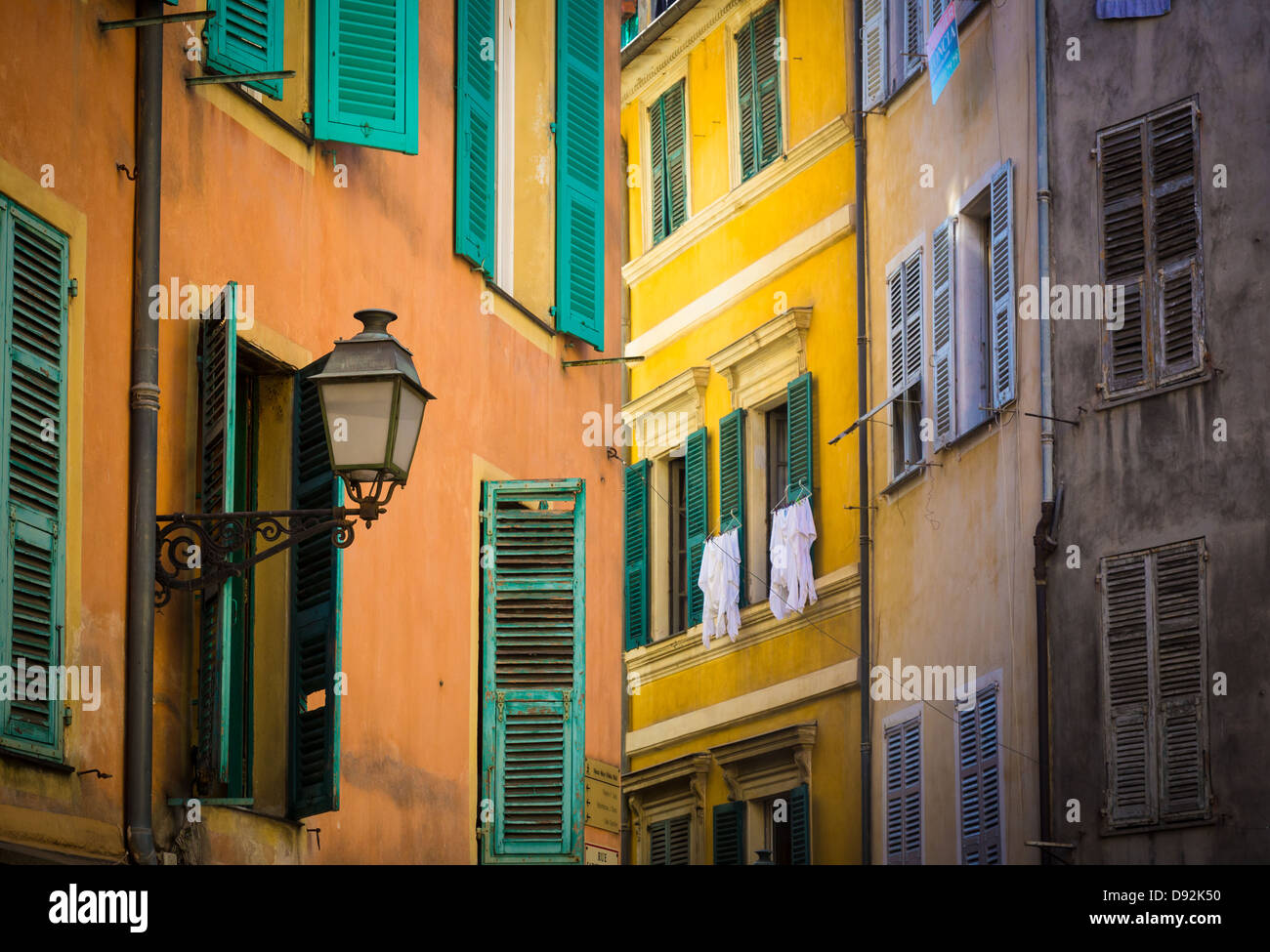 Typical French windows in the 'Vielle Ville' part of Nice, France Stock Photo