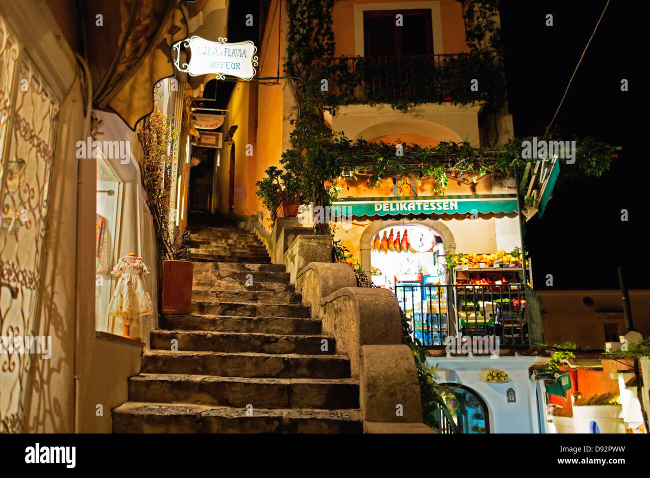 Food Market at Night on a Narrow Street, Positano, Campania, Italy Stock Photo