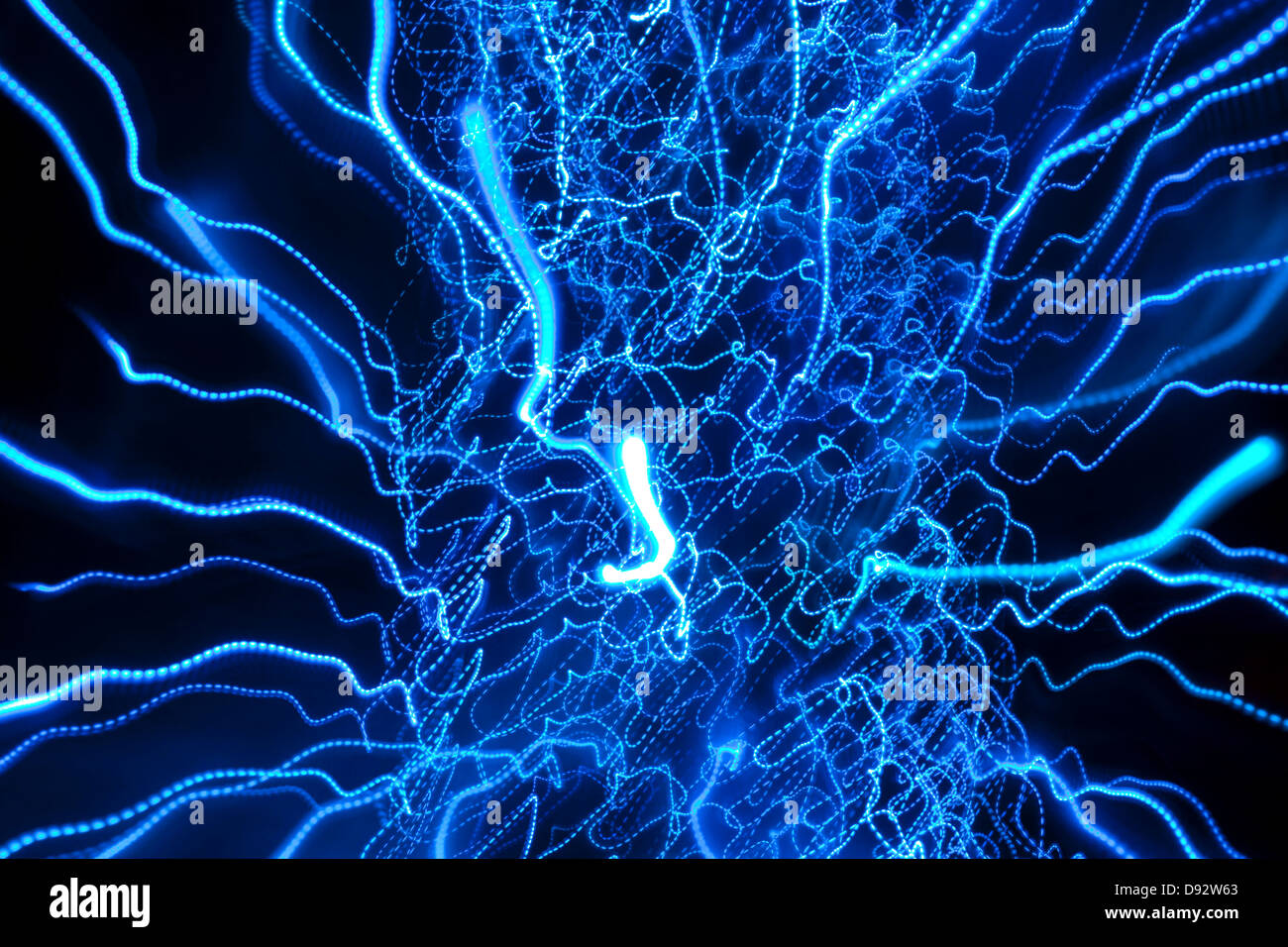 Blue squiggly light pattern Stock Photo