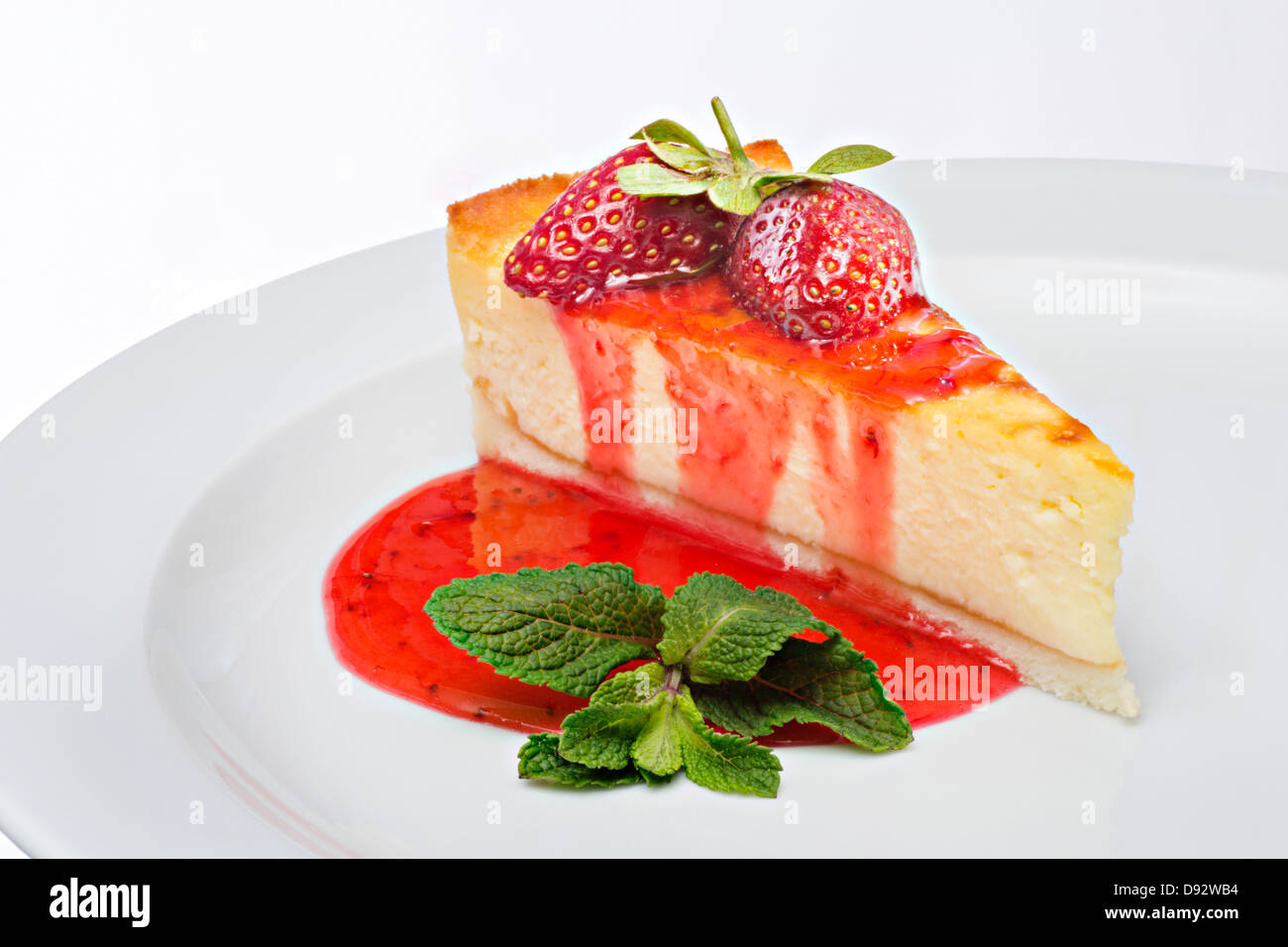 Garnished strawberry cheesecake Stock Photo