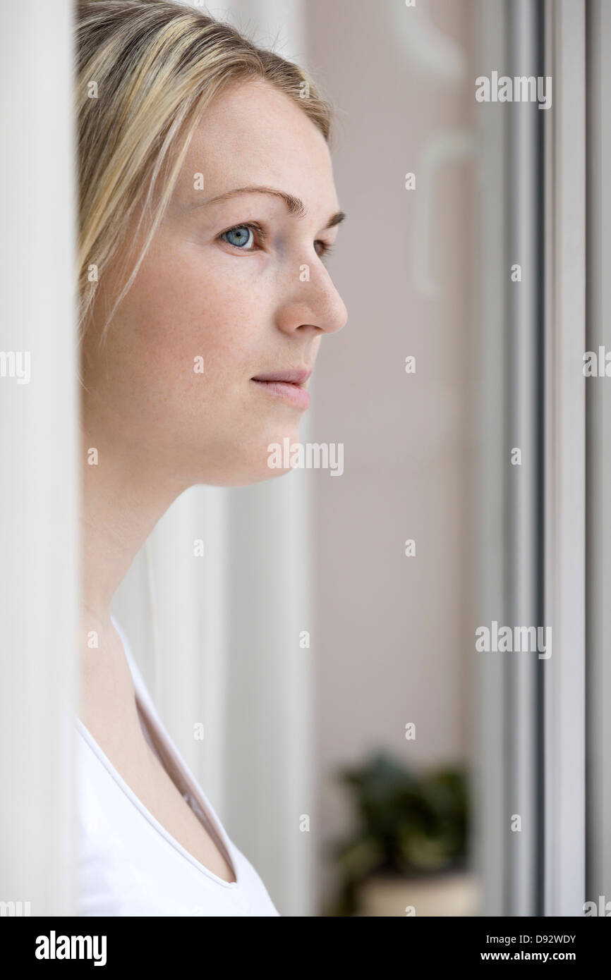 Woman looking into distance Stock Photo