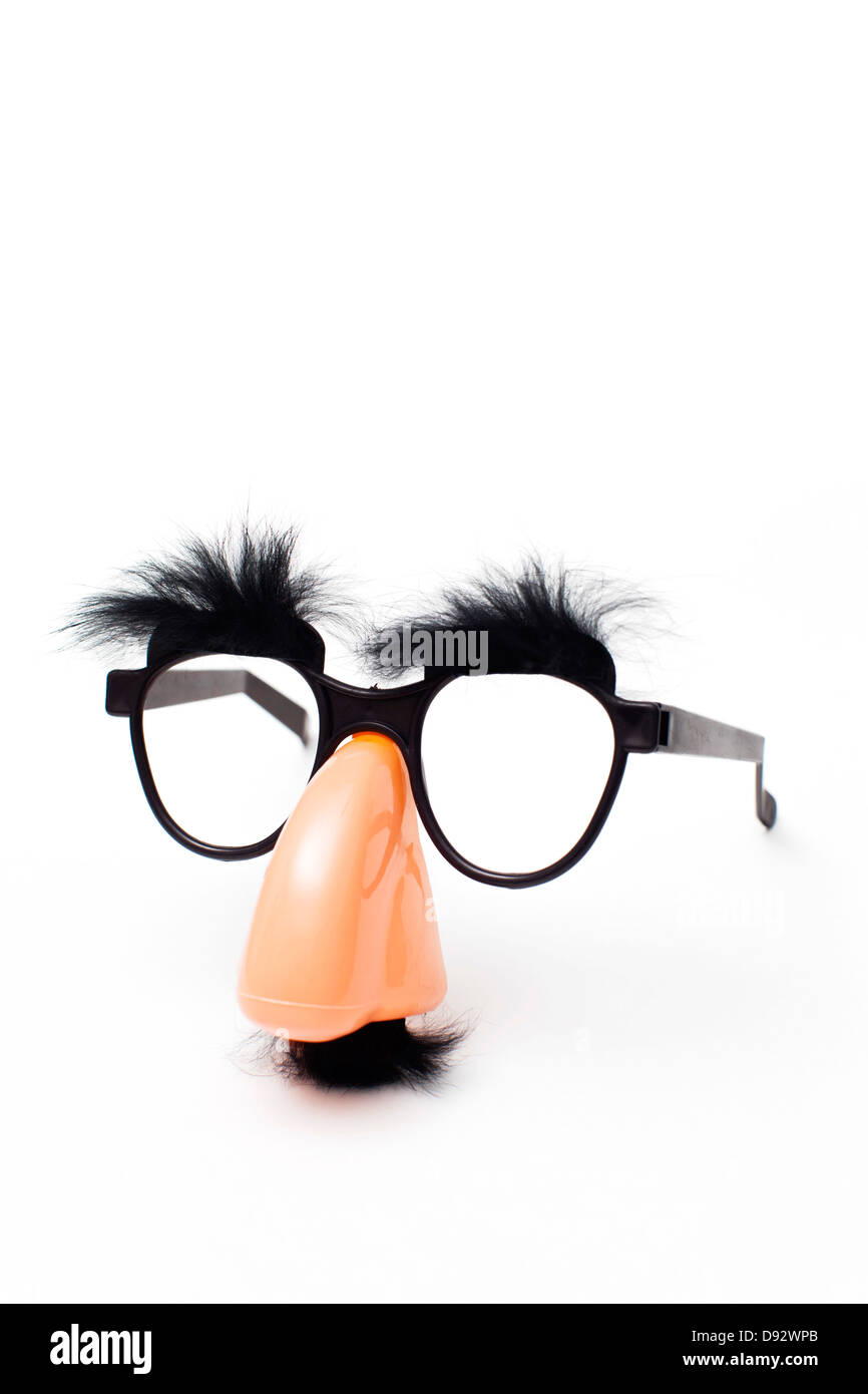 Groucho Marx novelty glasses on a white background Stock Photo