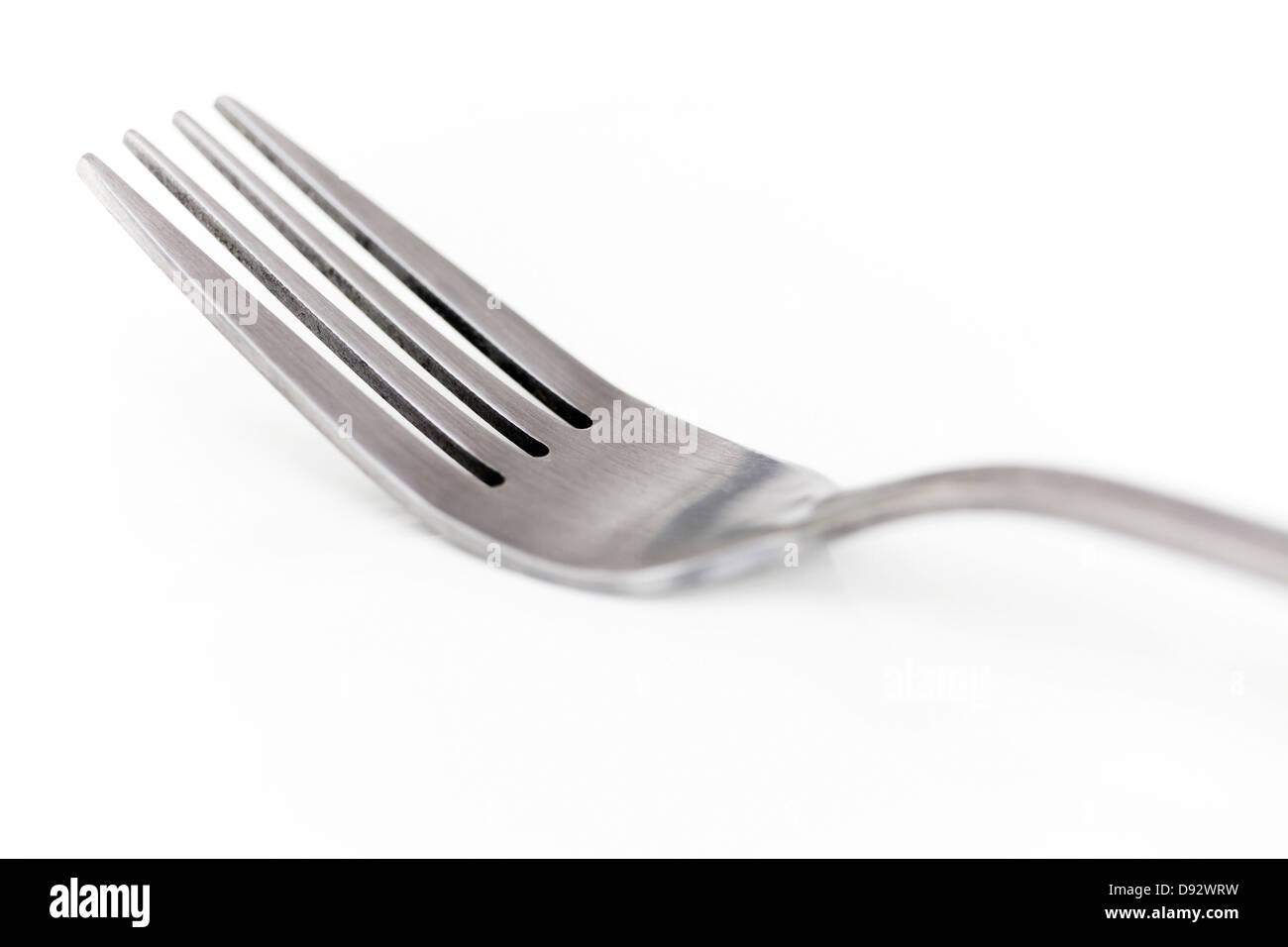 A clean stainless steel fork, close-up Stock Photo