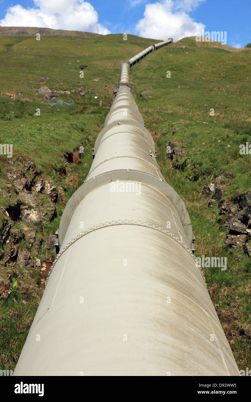 Over land pipes in Glen Lochay which are part of the Hydro-electric power scheme from the area Stock Photo