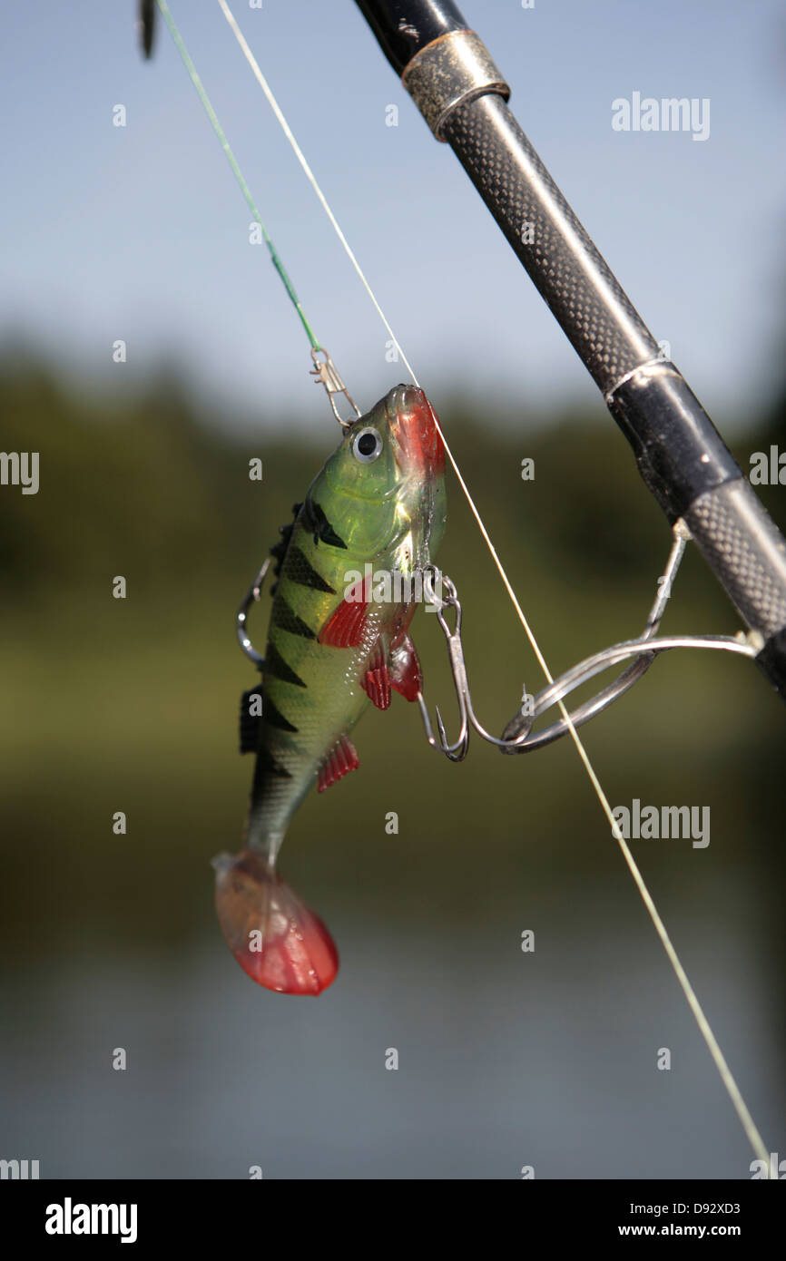 A fishing lure on the fishing line of a fishing rod Stock Photo