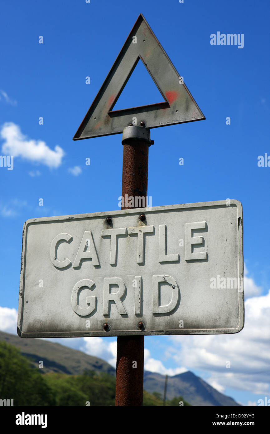 Old cattle grid sign in the Highlands of Scotland Stock Photo