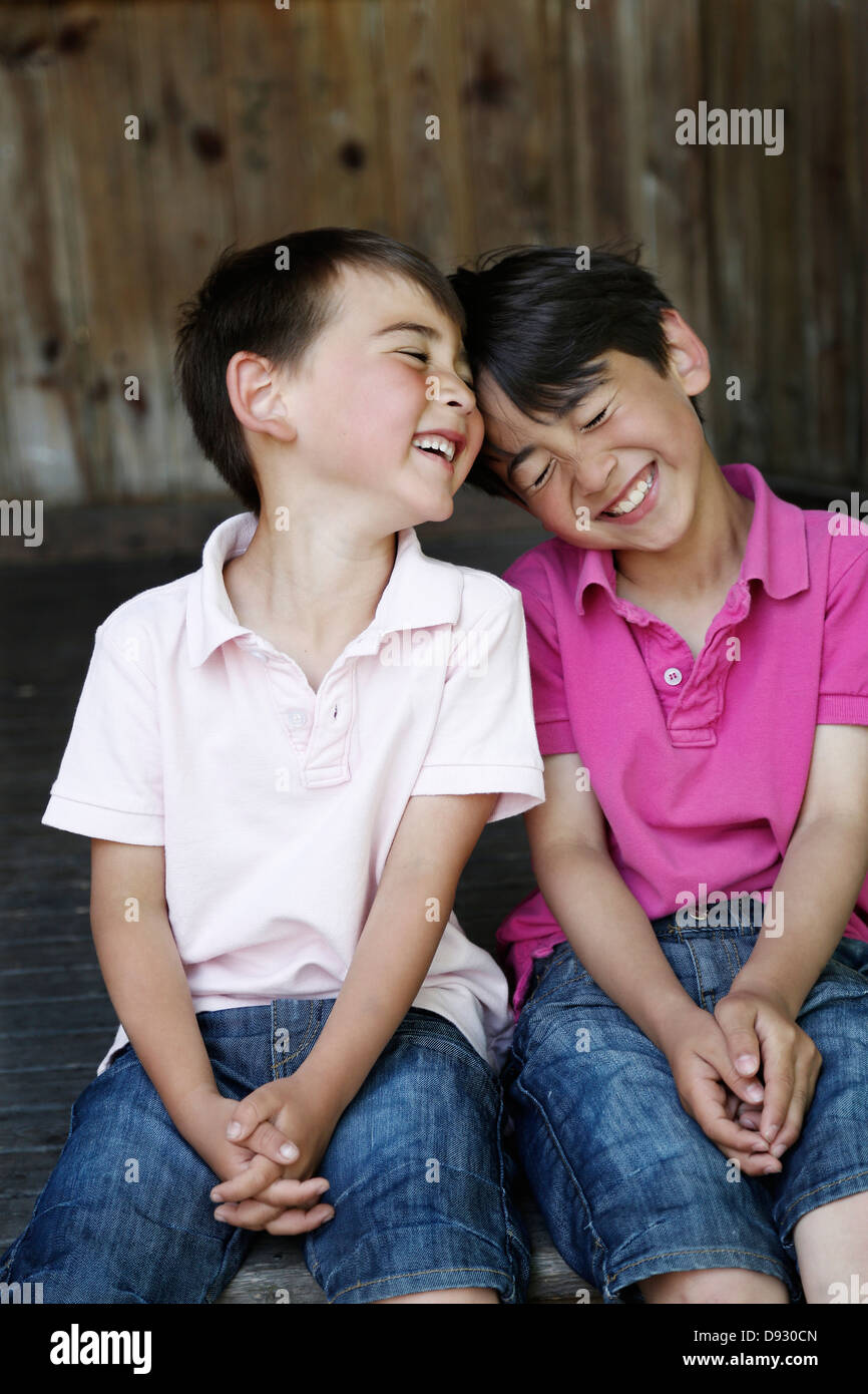 Portrait of two smiling boys Stock Photo - Alamy