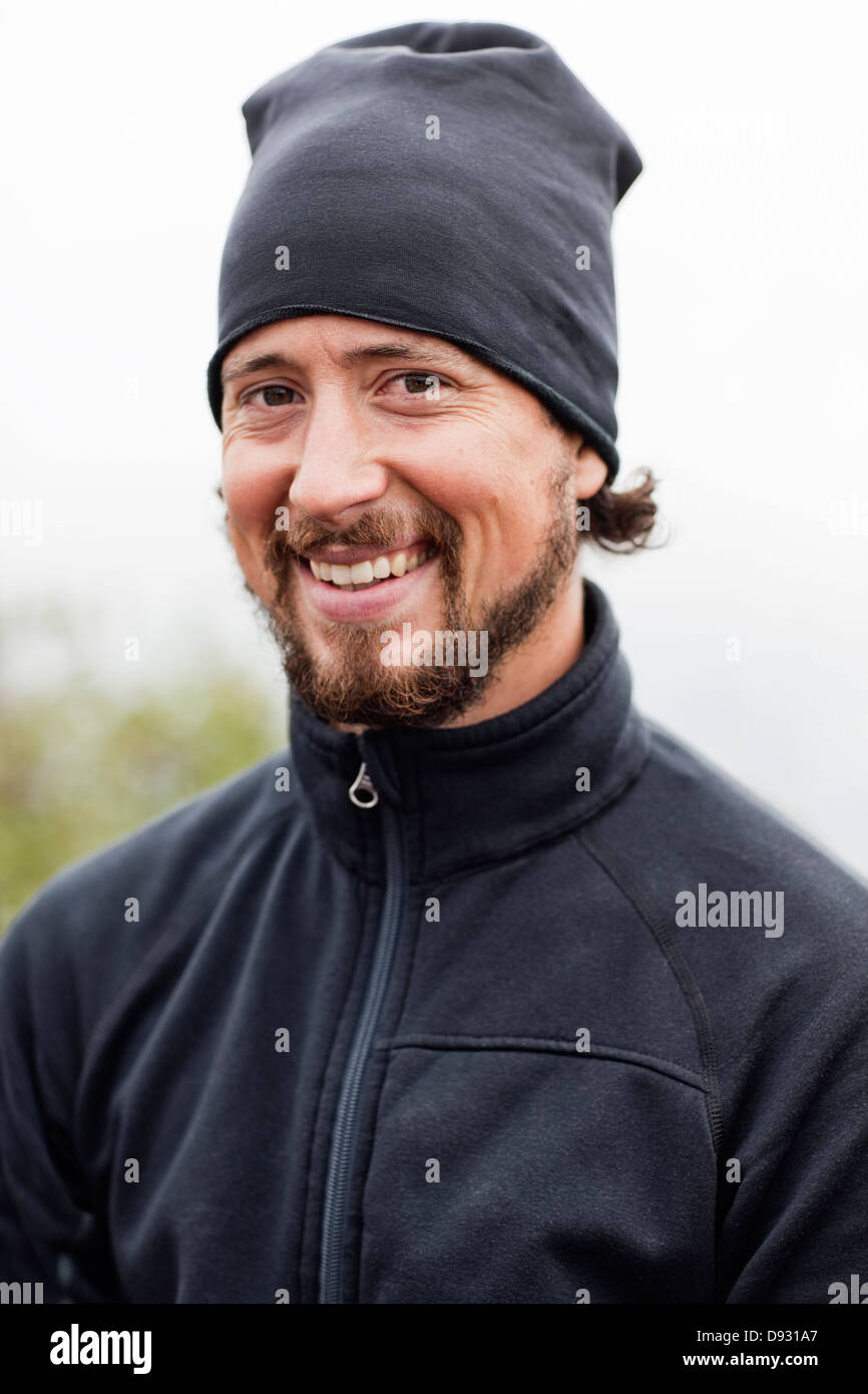 Portrait of smiling mid adult man Stock Photo