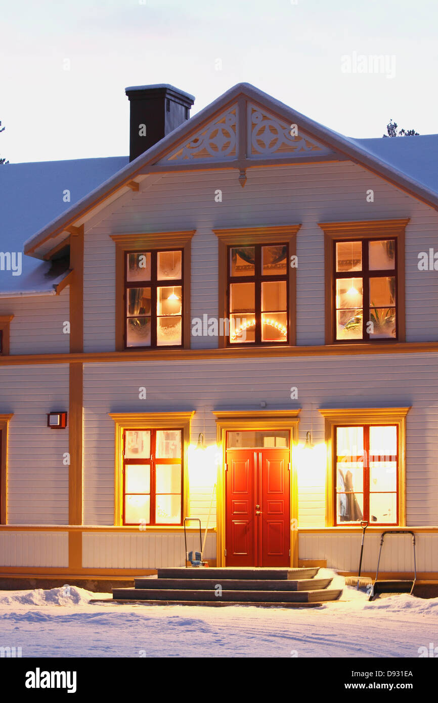 House illuminated at dusk Stock Photo - Alamy