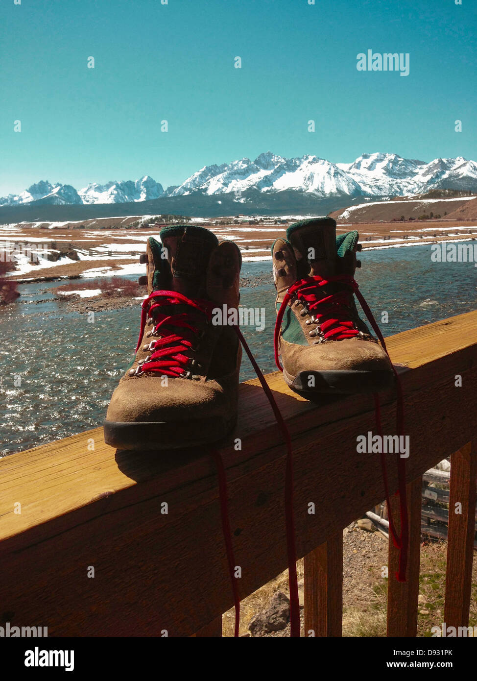 Hiking boots on snowy balcony - Smartphone Captured Stock Image