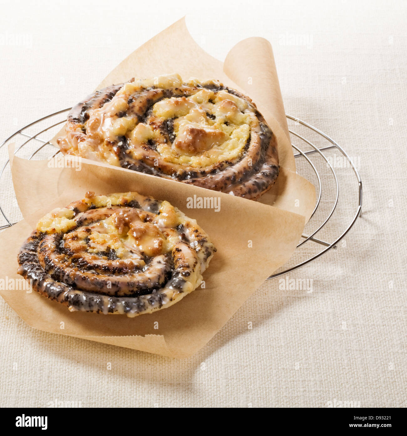 Poppy seed rolls, traditional german Mohnschnecke pastry, on cooling