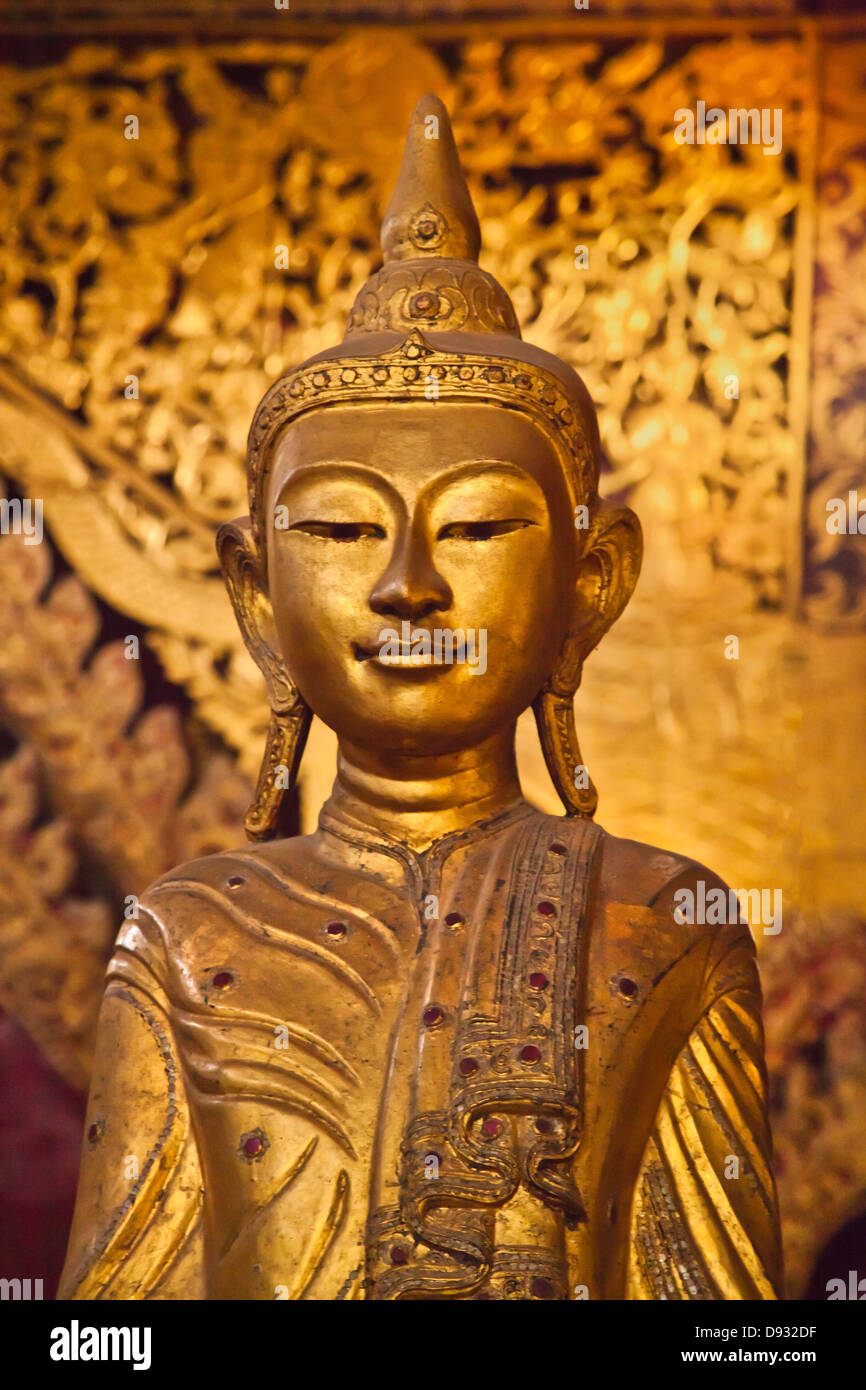 Ancient wooden BUDDHA STATUES in the main chapel of WAT JONG KHAM