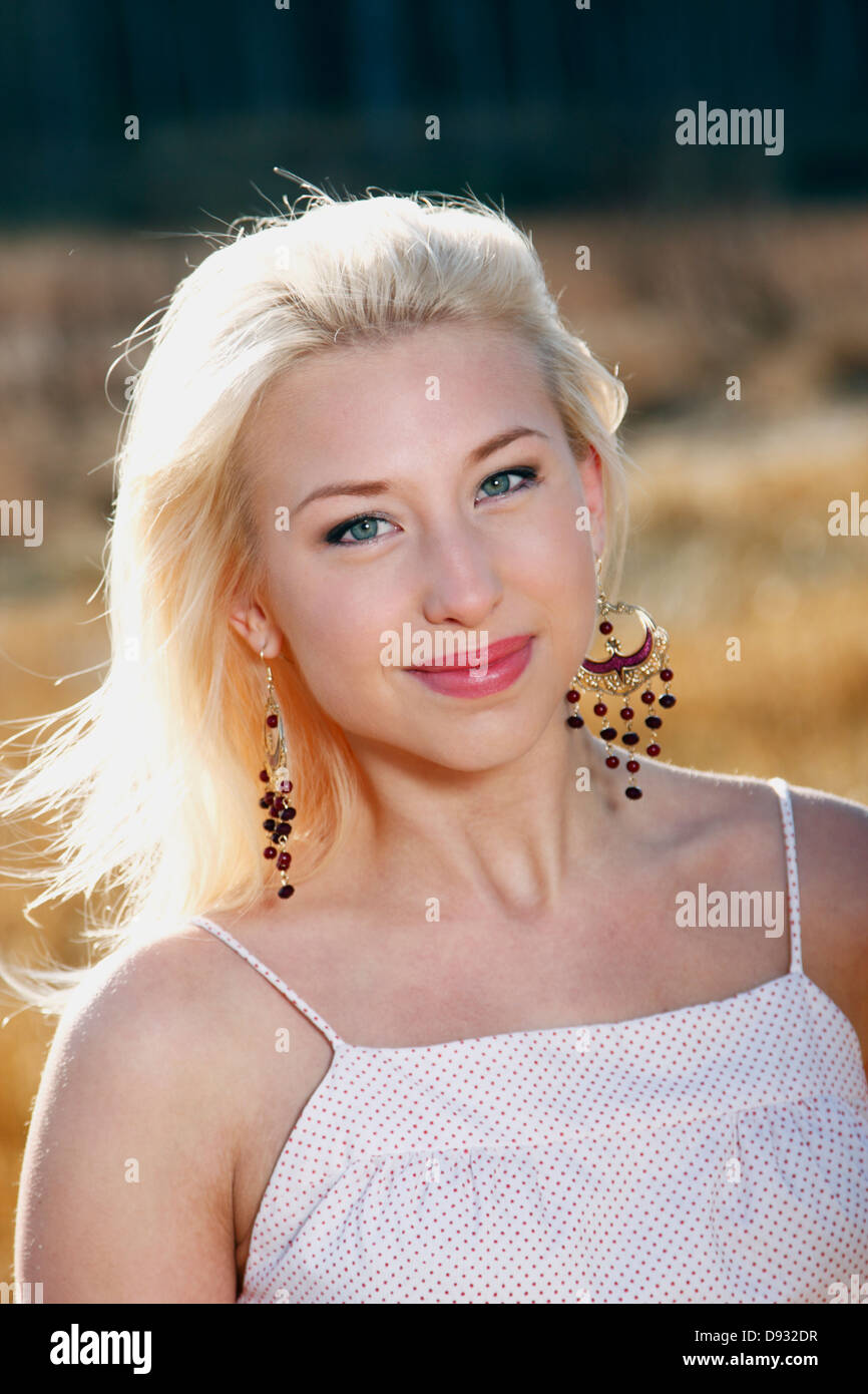 Young woman portrait dress smiling hi-res stock photography and images ...