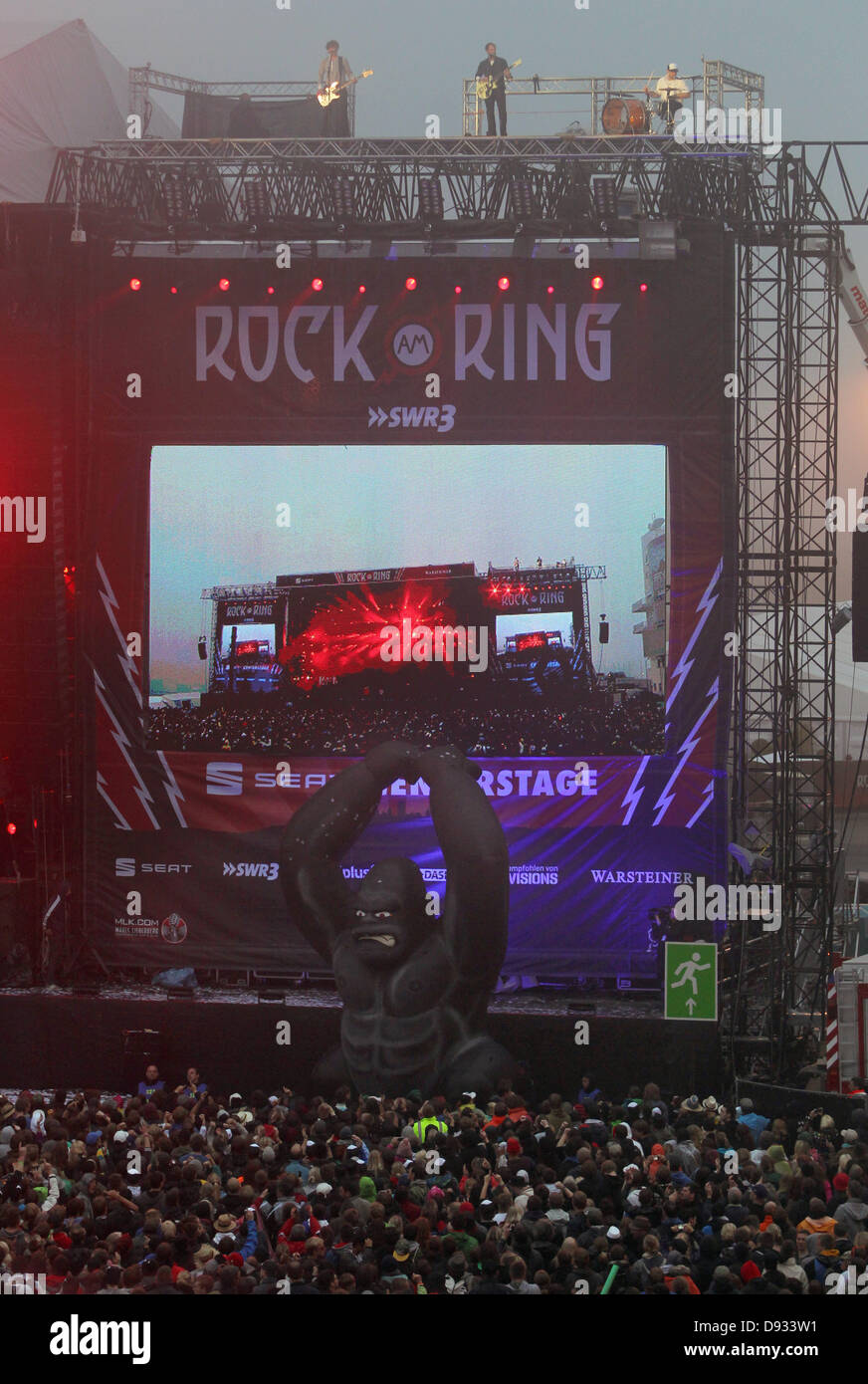 Nuerburg, Germany, 8 June 2013. The German rock band 'Sportfreunde Stiller' performs on the rooftop above the central stage  at the Rock am Ring music festival in Nuerburg, Germany, 9 June 2013. Credit:  dpa picture alliance/Alamy Live News Stock Photo