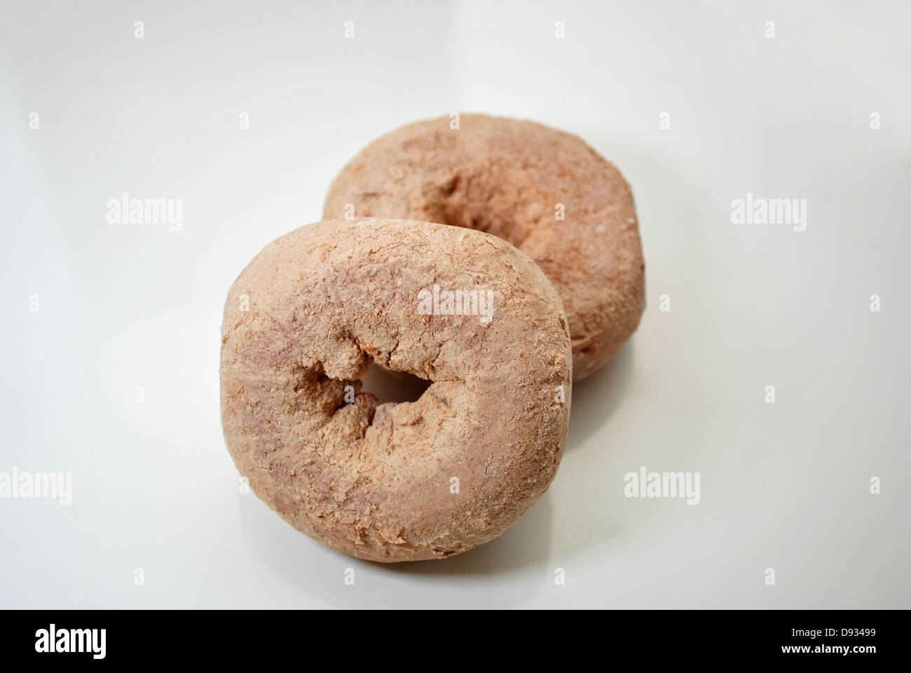 Two Cinnamon Covered Doughnuts Stock Photo