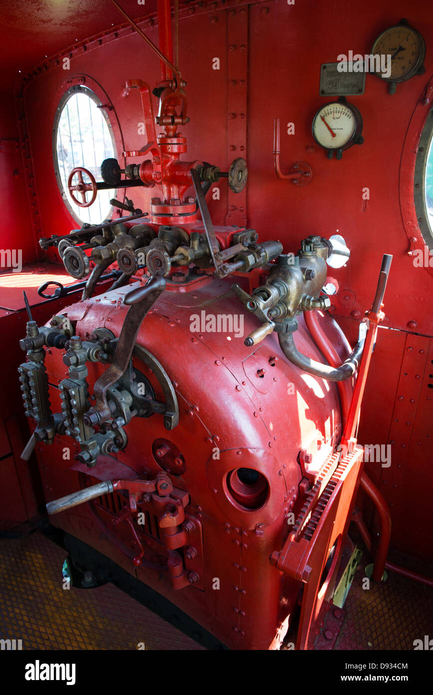 Controls in red engine room of steam Stock Photo Alamy