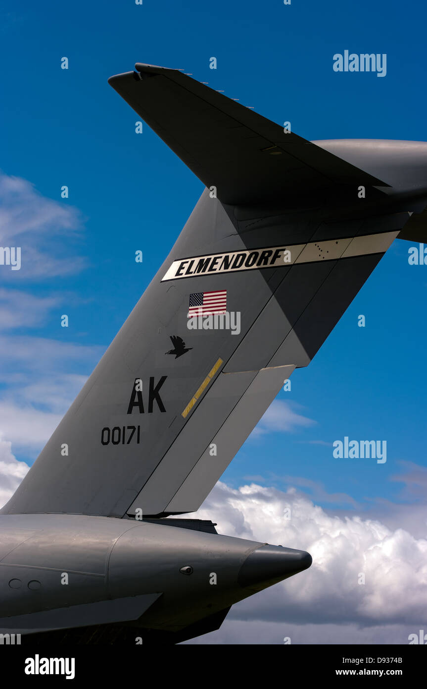Tail plane of a USAF Boeing C-17 Globemaster airplane based in Elmendorf, Alaska. Stock Photo