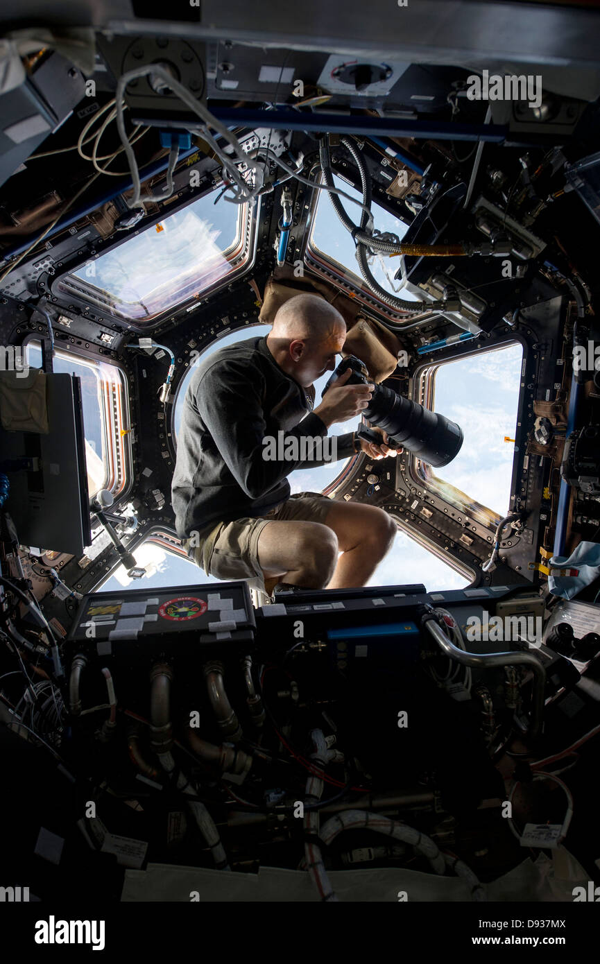 ISS Expedition 36 NASA astronaut Chris Cassidy takes a photograph with a 400mm lens from the Cupola aboard the International Space Station on June 3, 2013. Stock Photo
