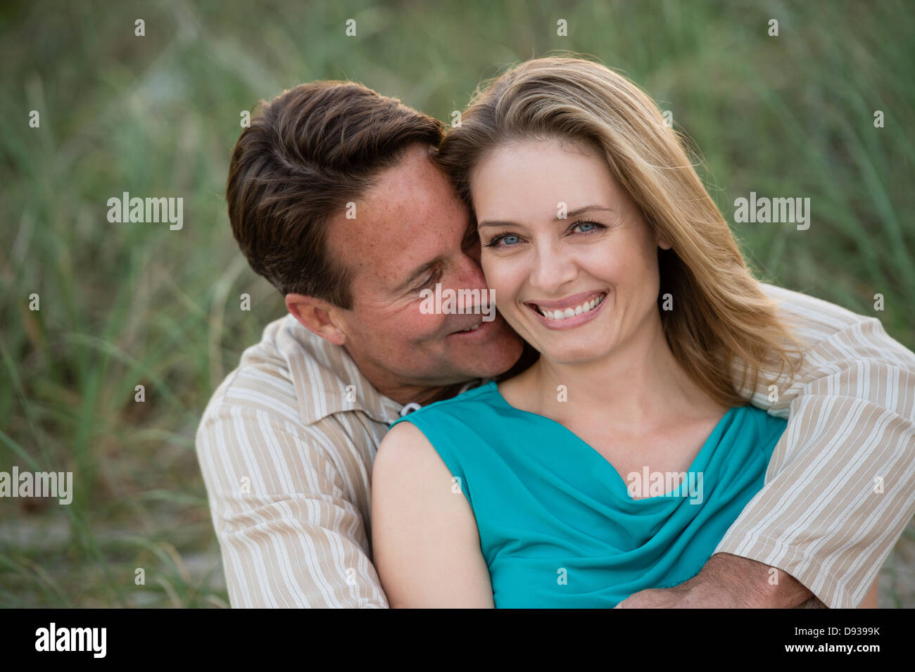Couple hugging outdoors Stock Photo - Alamy