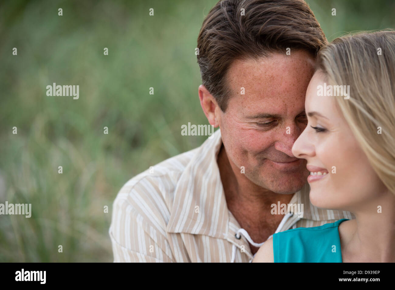 Couple hugging outdoors Stock Photo - Alamy