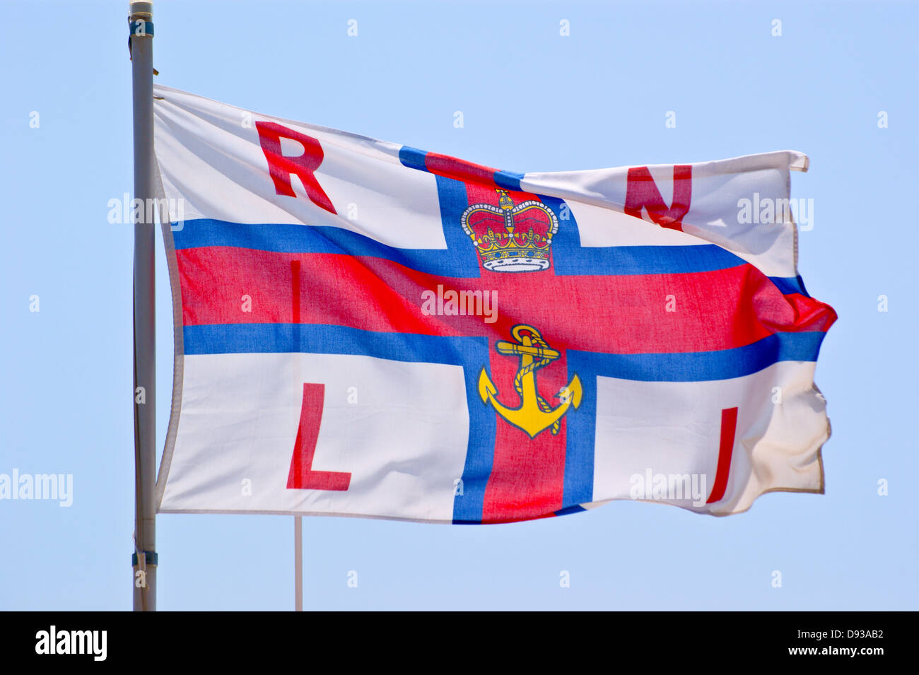 RNLI and lifeguard flags, on Bournemouth Beach, Dorset England Stock