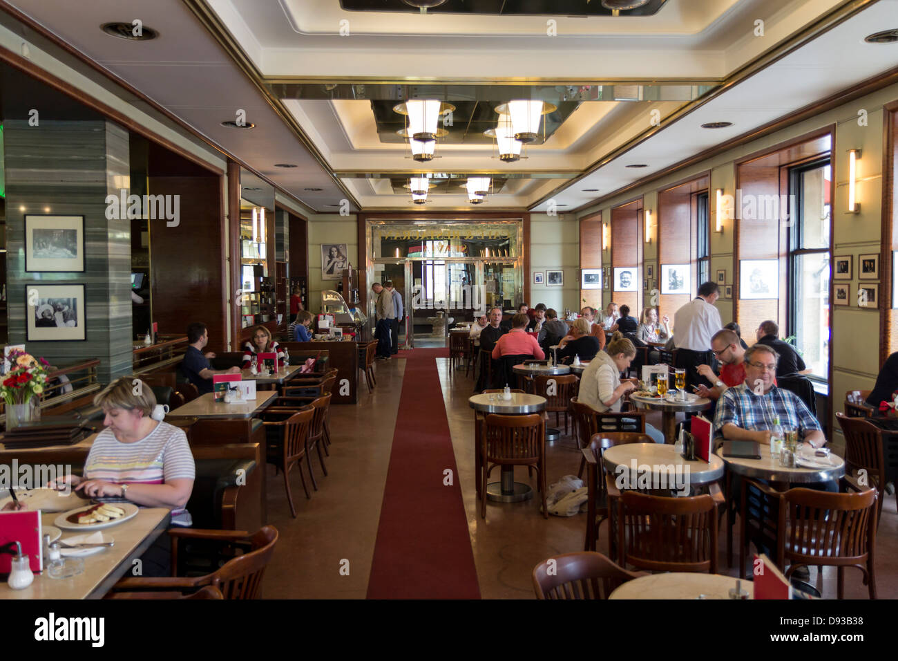 Guests in the Cafe Slavia in Prague, Czech Republic Stock Photo