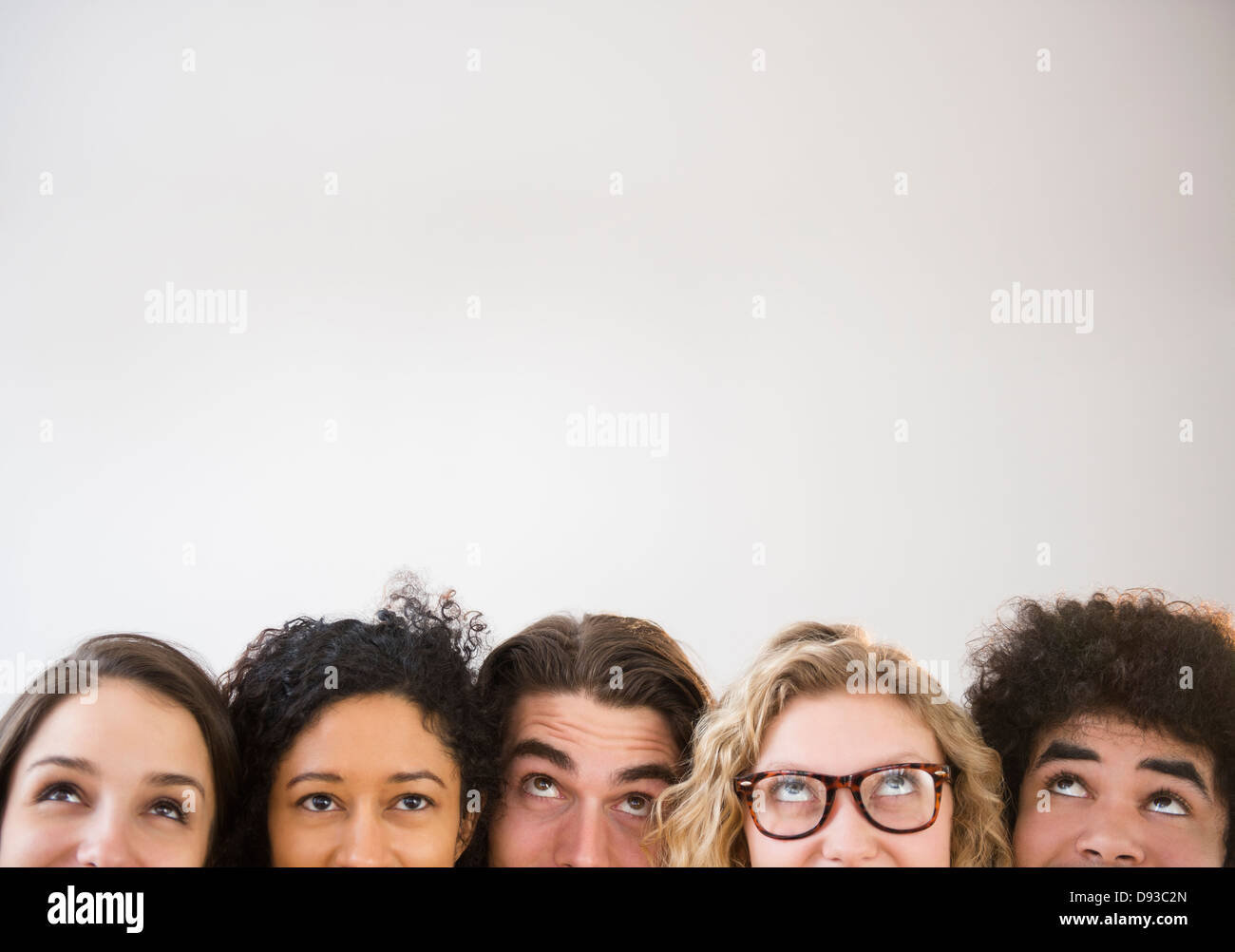 Friends looking up Stock Photo