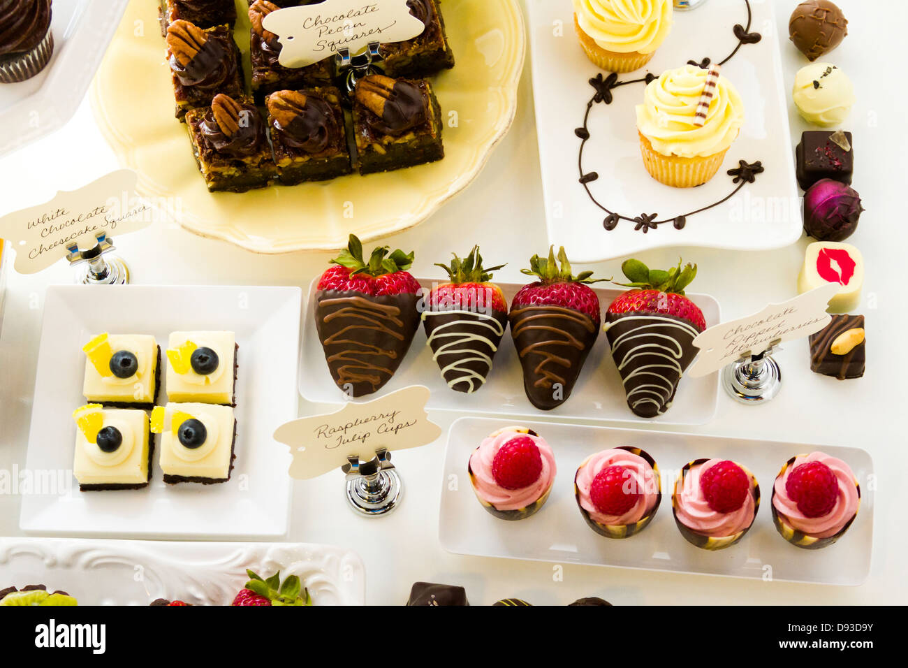 Dessert bar with assorted chocolate sweets Stock Photo Alamy