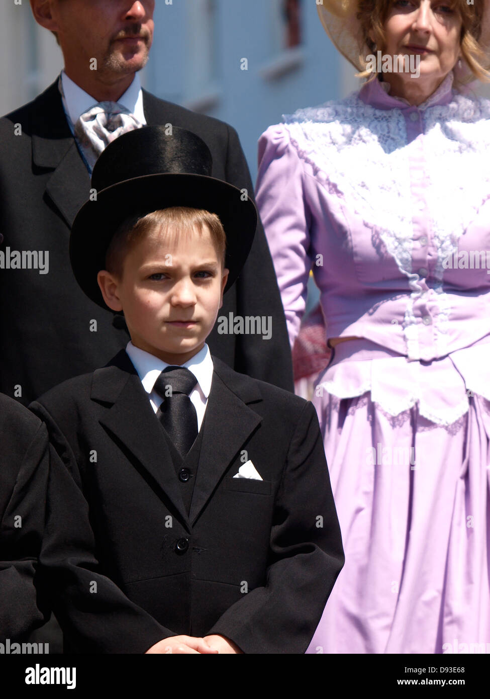 Young boy in a suit with top hat, Ilfracombe Victorian Celebration Parade, Devon, UK 2013 Stock Photo