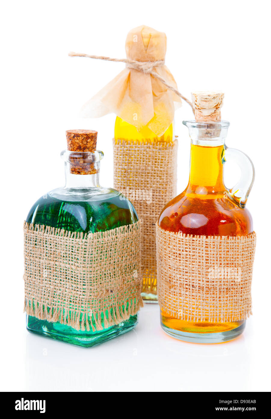 A full three bottle on a white background Stock Photo - Alamy