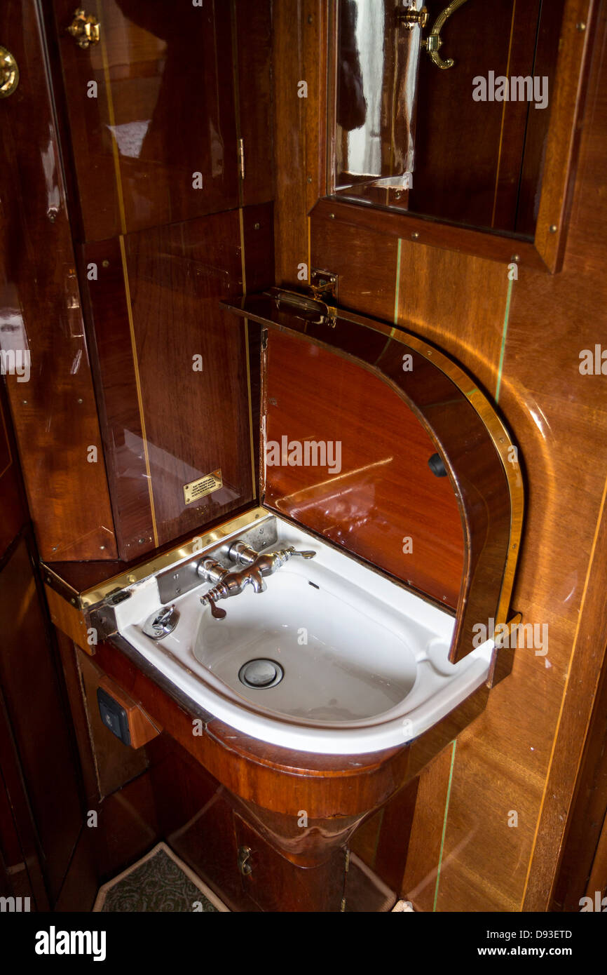 Venice Simplon Orient Express carriage, cabin interior, washbasin when open and table when closed Stock Photo