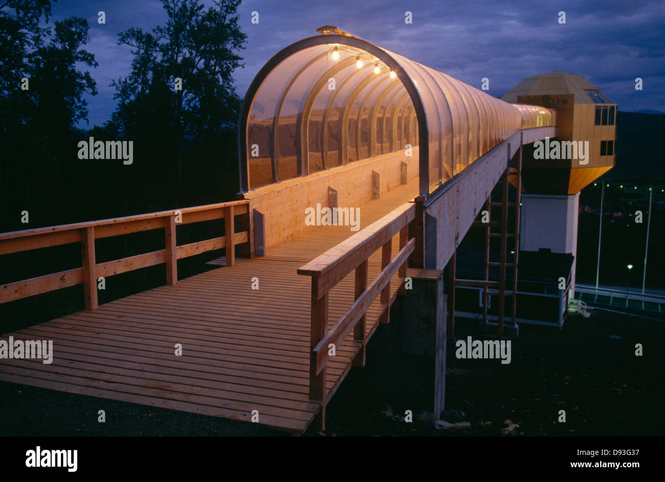 View of elevated walkway at night Stock Photo