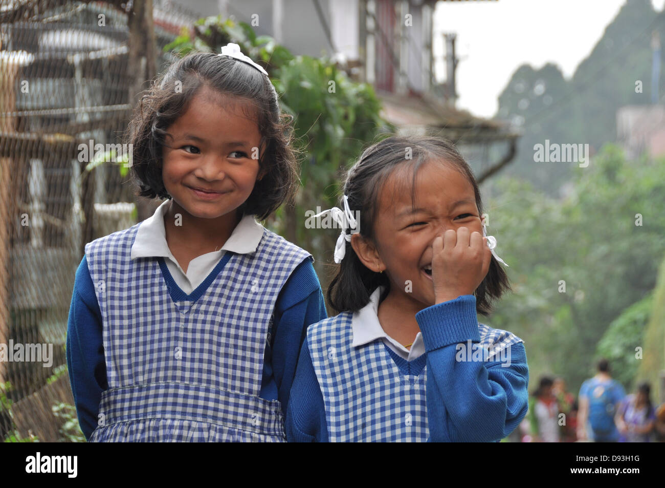 Young girls in uniform on the way to school Darjeeling, West Bengal, India Stock Photo