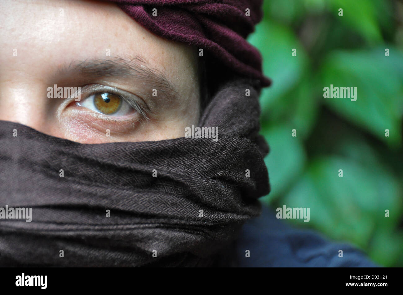A portrait of a young middle eastern Man wearing a kaffiyeh Model Release Available Stock Photo