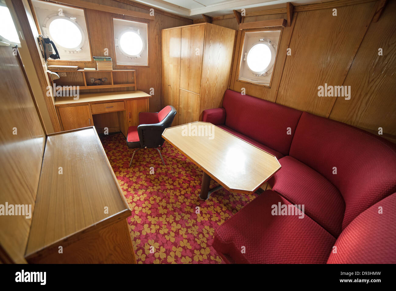 Cabin with sitting area inside the SS Soldek ship, part of the Polish Maritime Museum in Gdansk, Poland. Stock Photo