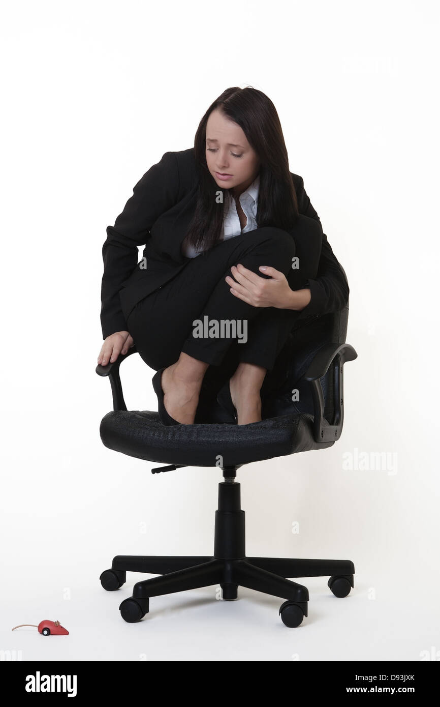 Woman mouse chair afraid hires stock photography and images Alamy