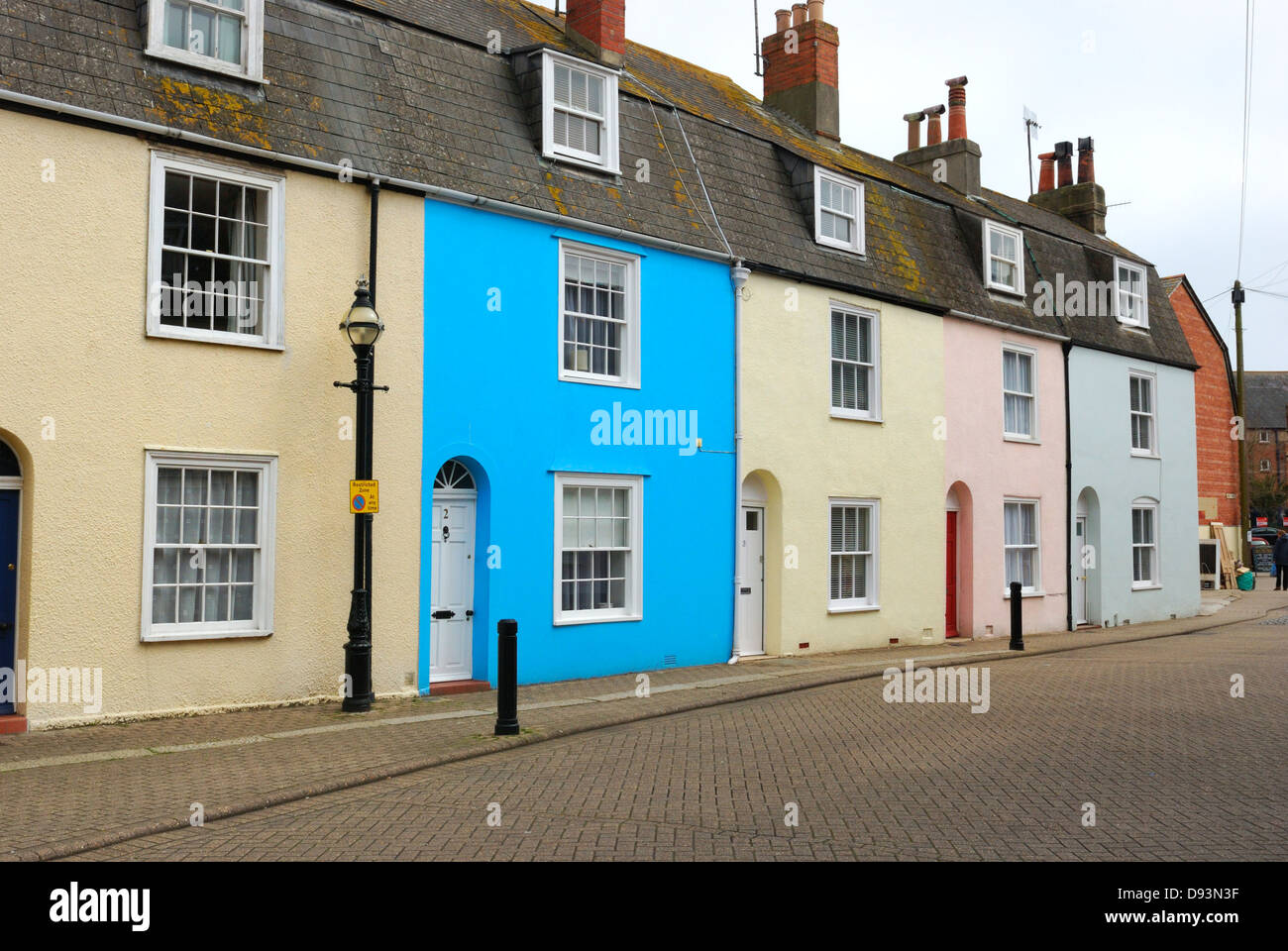 Pastel coloured terraced houses hope street Weymouth Dorset England UK Stock Photo
