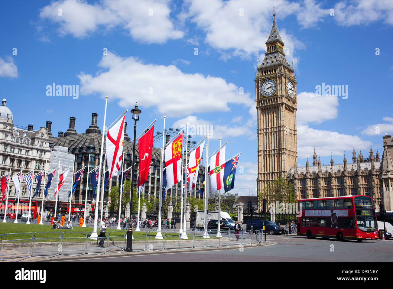 Flags of Her Majesty's Crown Dependencies and Overseas Territories, Parliament Square and Big Ben, London England. Stock Photo