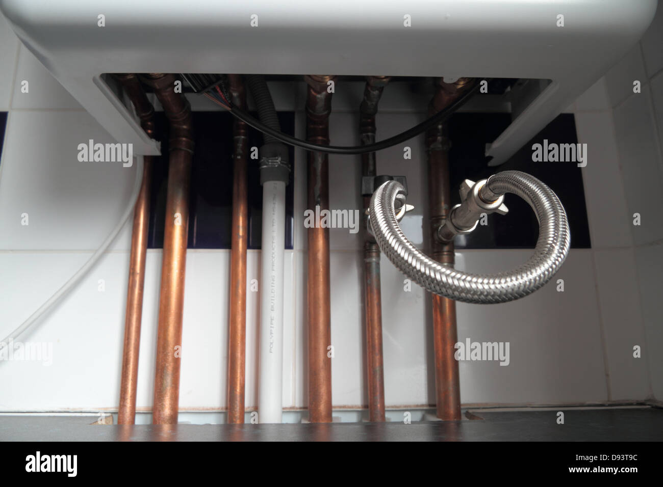 Combi Condensing Gas Boiler, with analogue timer dial. Exposed copper