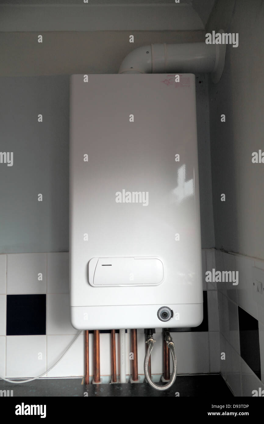 Combi Condensing Gas Boiler, with analogue timer dial. Exposed copper