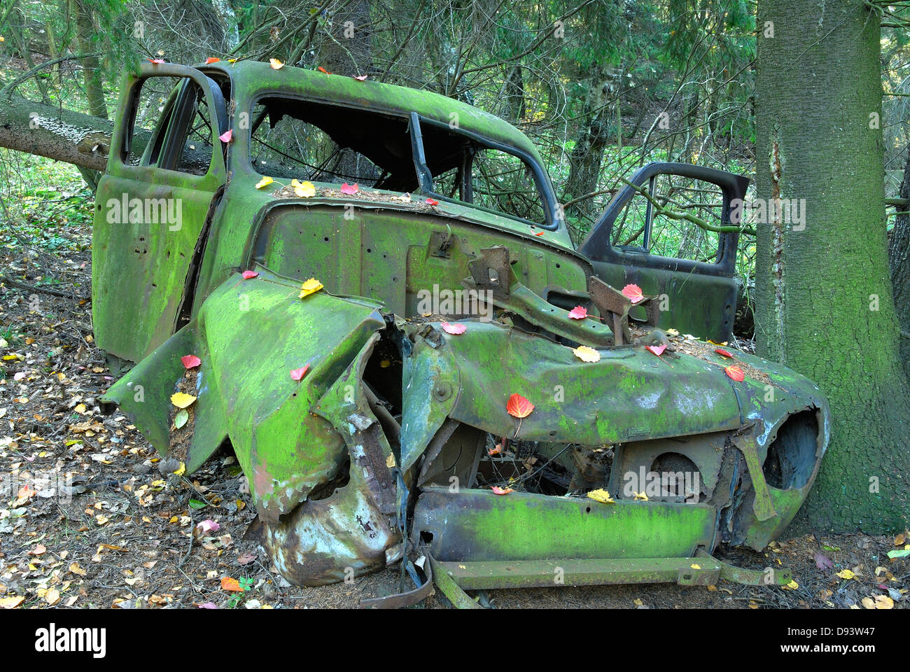 Scrap vehicle in a forest Stock Photo - Alamy