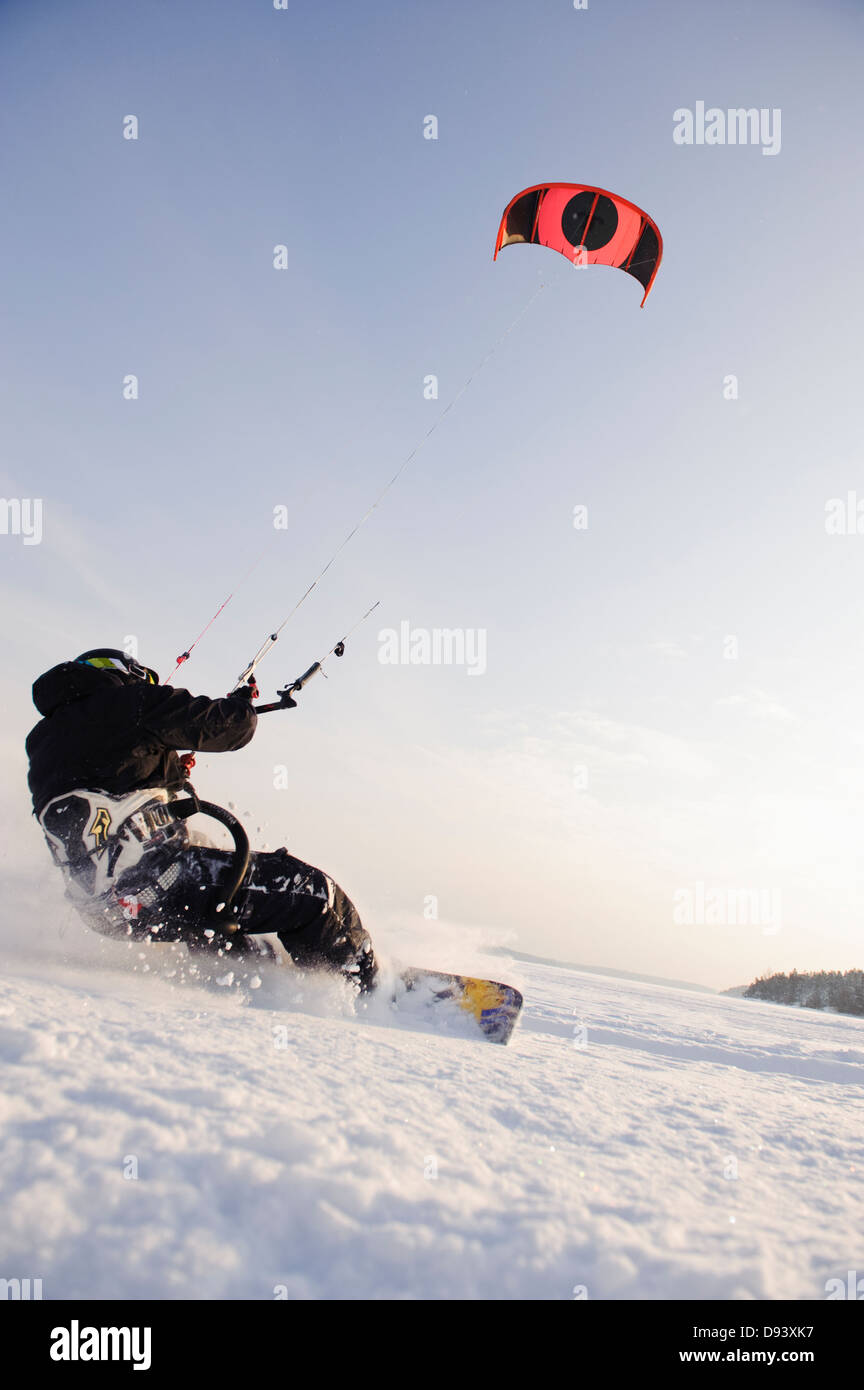 Man kiteboarding in snow Stock Photo Alamy