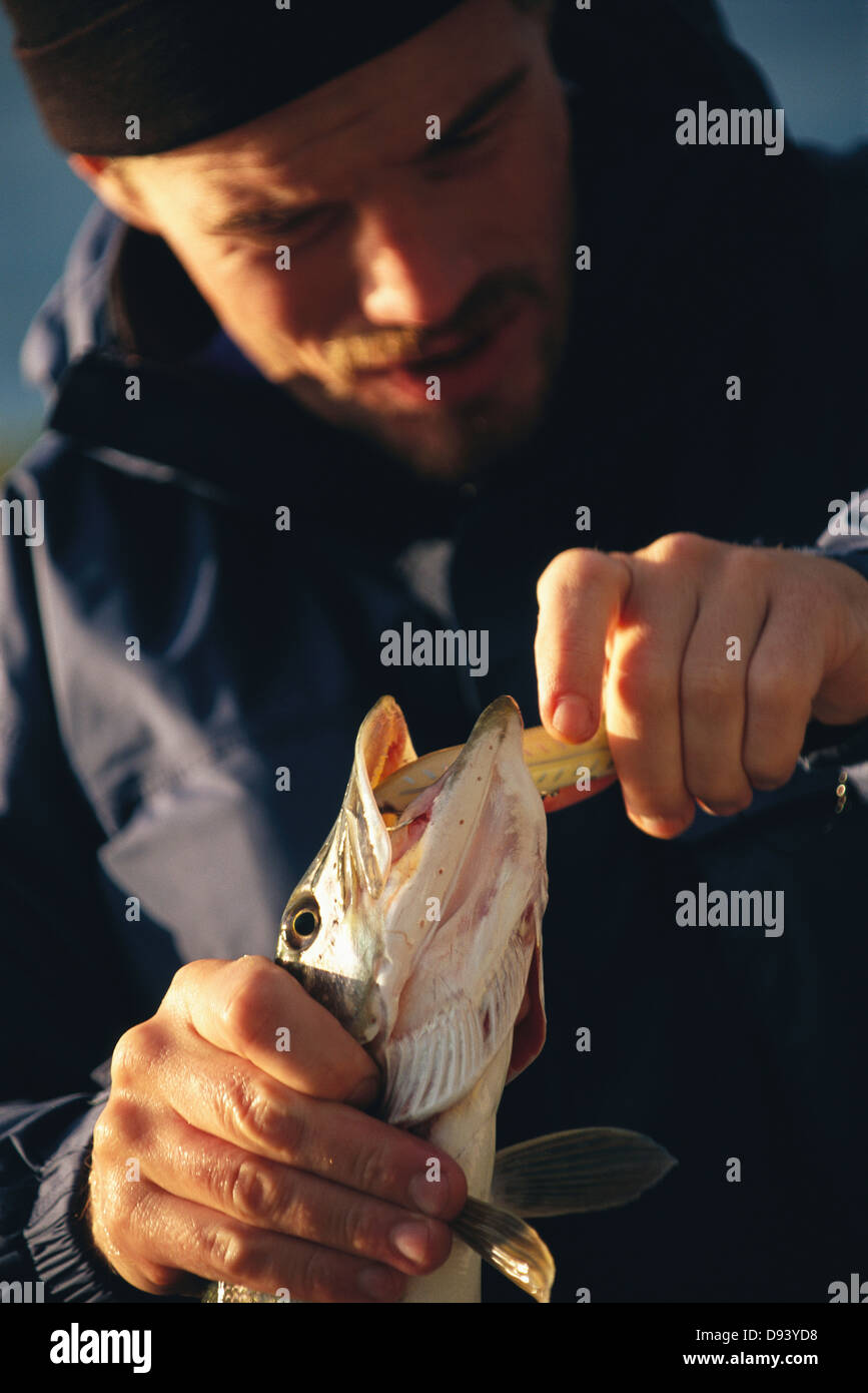 A man with a fish, Sweden. Stock Photo