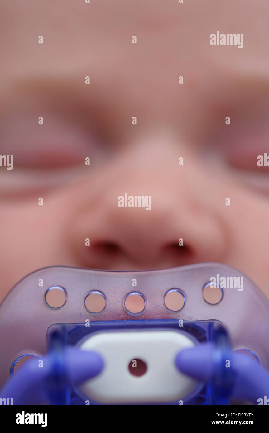 Extreme closeup of newborn sleeping with pacifier in mouth Stock Photo Alamy