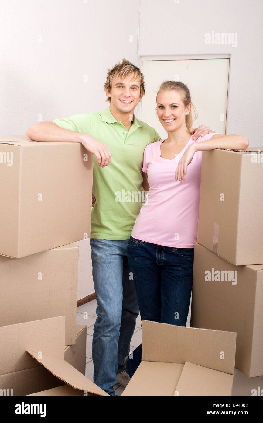 young happy couple moving to their new home Stock Photo - Alamy