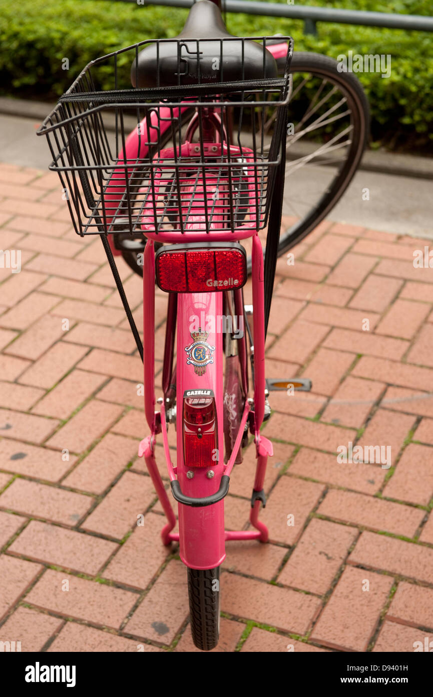 Bright Pink Bicycle Bike with Basket Ladies Lady Stock Photo