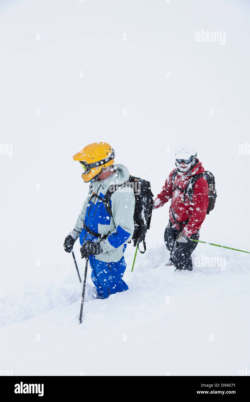 Two skiers in deep snow Stock Photo