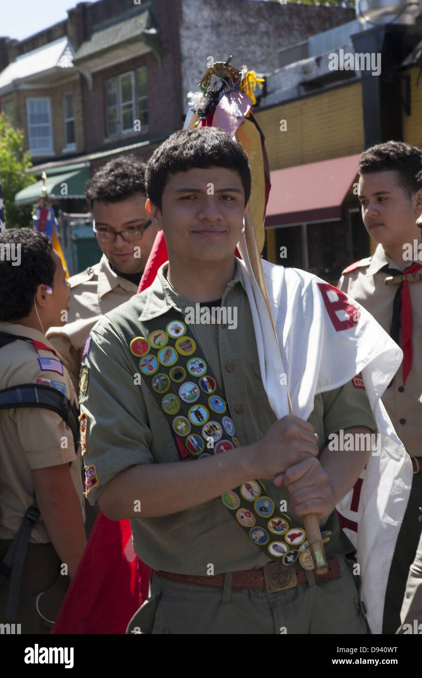 Boy Scout displays many merit badges across his chest waiting to march in the Memorial Day Parade in Bay Ridge, Brooklyn. Stock Photo